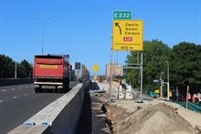 18. De tijdelijke bebording staan op de bouwplaats vlak naast de N7